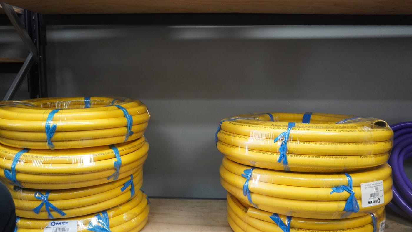 Coils of Pirtek hydraulic and industrial hose in stock at Pirtek Townsville