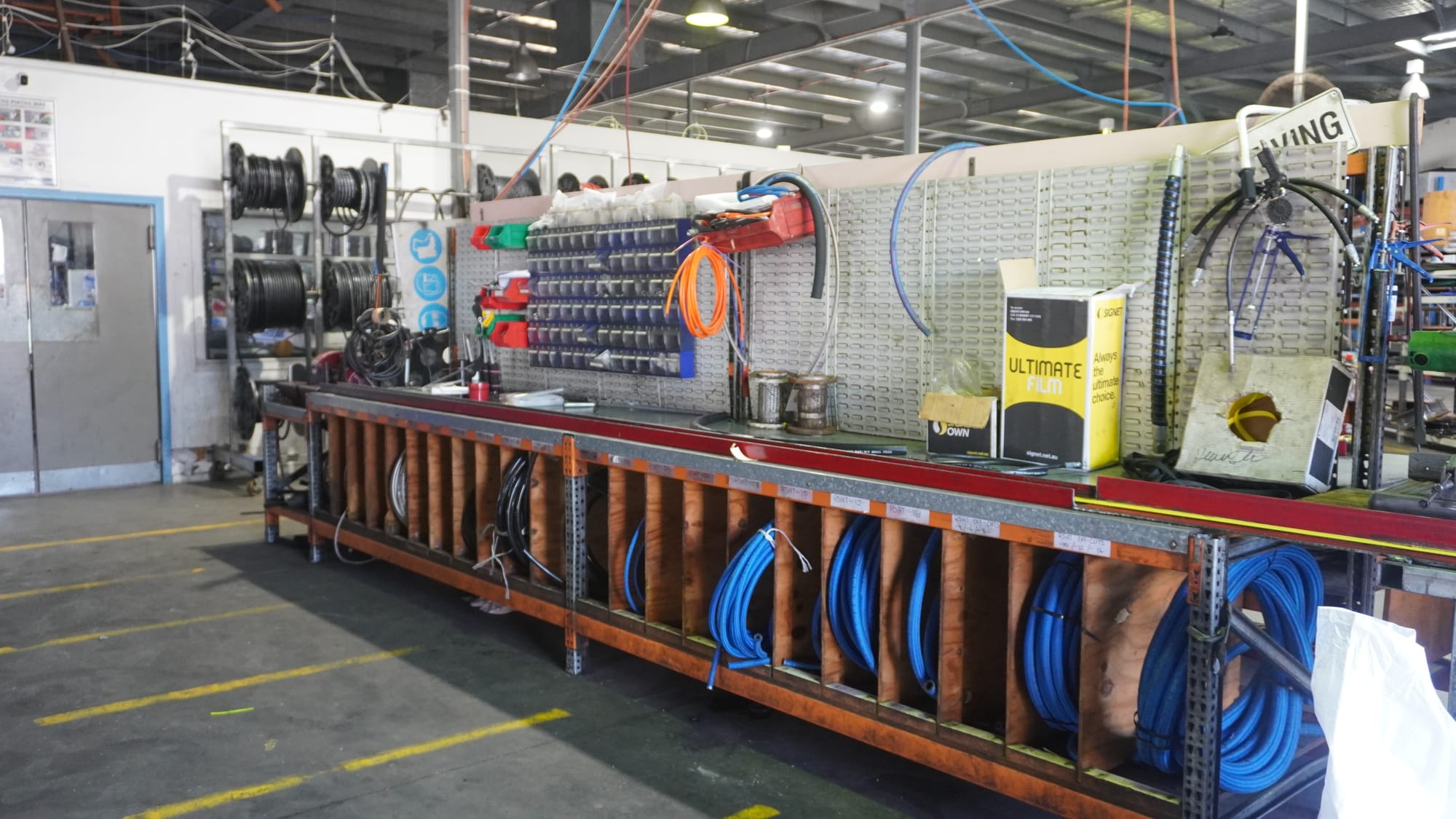 Pirtek Townsville workshop hose racks — one of the largest hose ranges in North Queensland
